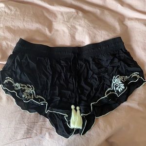 Black beach shorts with tassel